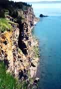 view from top of big split along cliffs and beach to little split